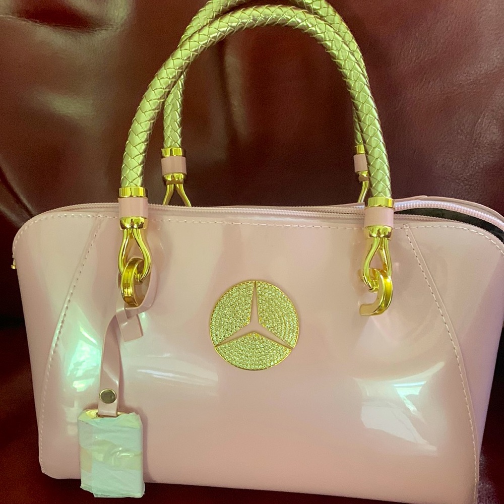 Mercedes Benz purse Powder Pink/Gold hardware.  Free key ring and shipping